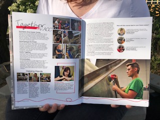 Alyssa holding yearbook